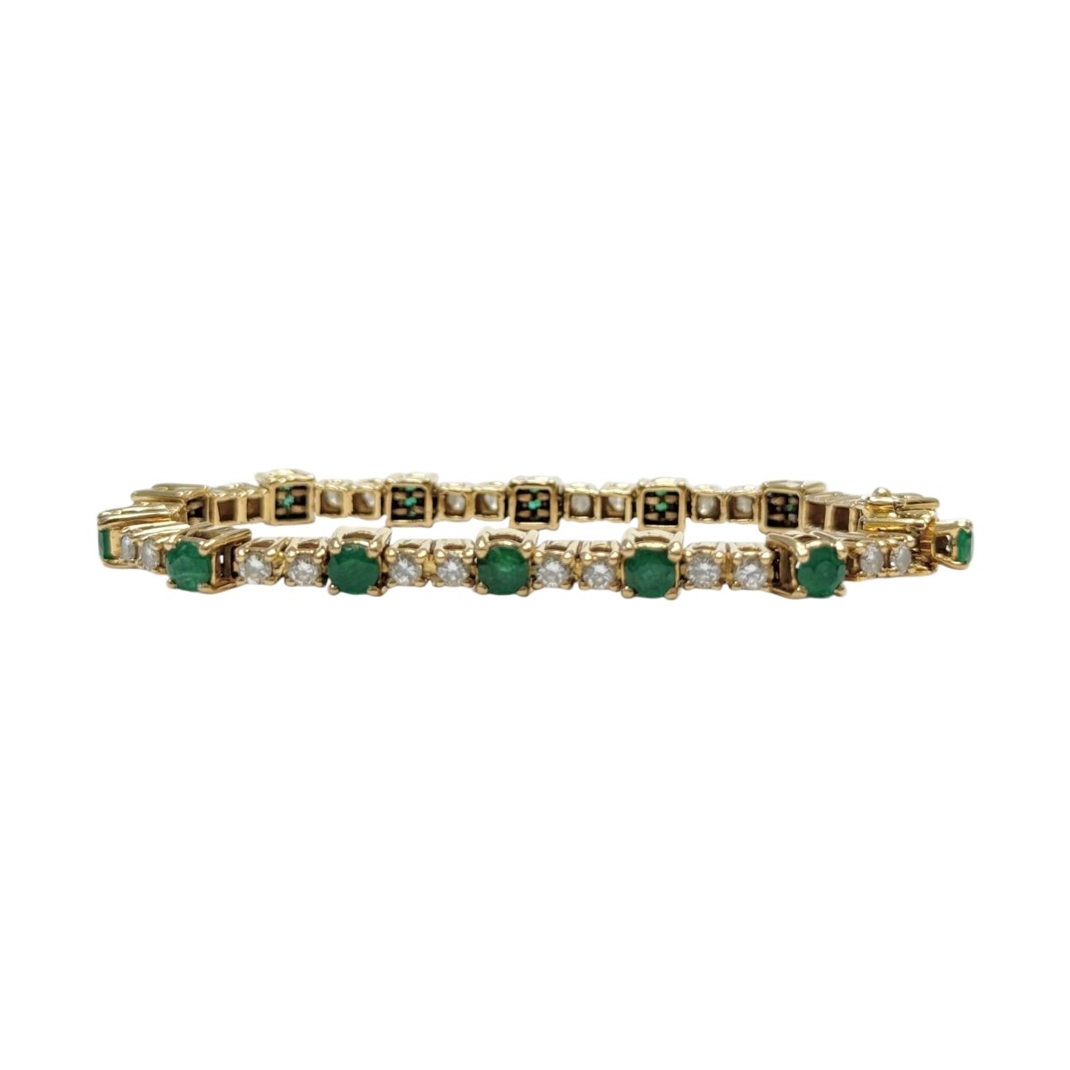 Bracelet Ligne en or jaune, émeraudes et diamants - Castafiore