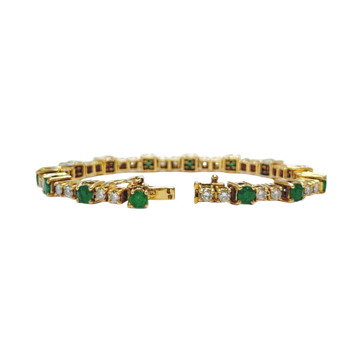 Bracelet Ligne en or jaune, émeraudes et diamants - Castafiore
