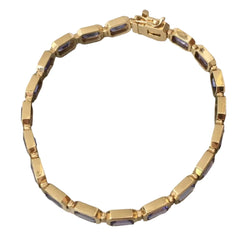 Bracelet Ligne en or jaune et tanzanites - Castafiore