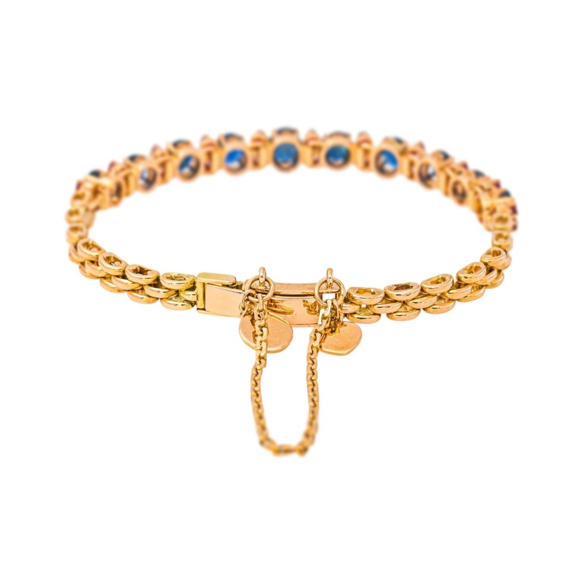 Bracelet Ligne en or jaune, or rose, saphirs et rubis - Castafiore
