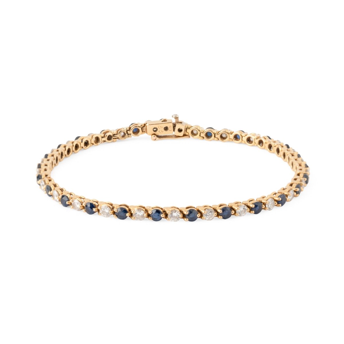 Bracelet Ligne en or jaune, saphirs et diamants - Castafiore