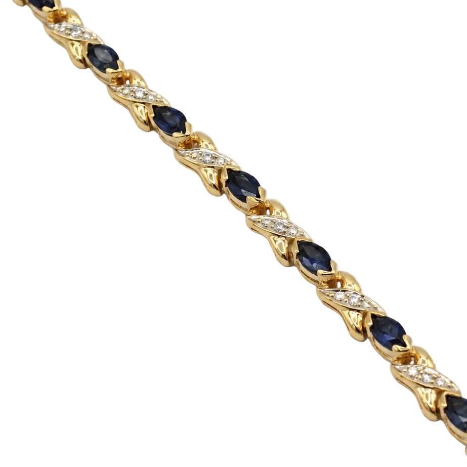 Bracelet Ligne en or jaune, saphirs et diamants - Castafiore