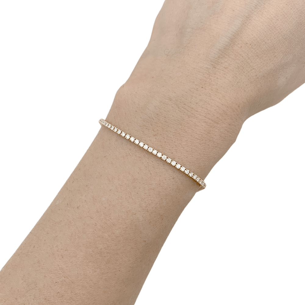 Bracelet ligne tennis en or rose, diamants. - Castafiore