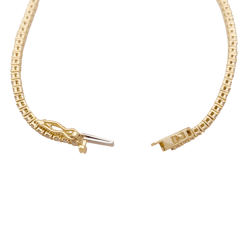 Bracelet ligne tennis or jaune, diamants. - Castafiore