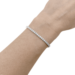 Bracelet line, white gold and diamonds.