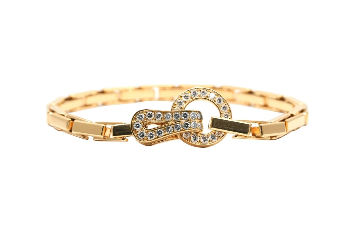 Bracelet Maille CARTIER "Agrafe" en or jaune et diamants - Castafiore