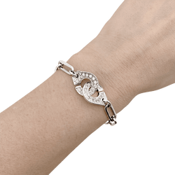 Bracelet Dinh Van, "Handcuffs", white gold and diamonds.