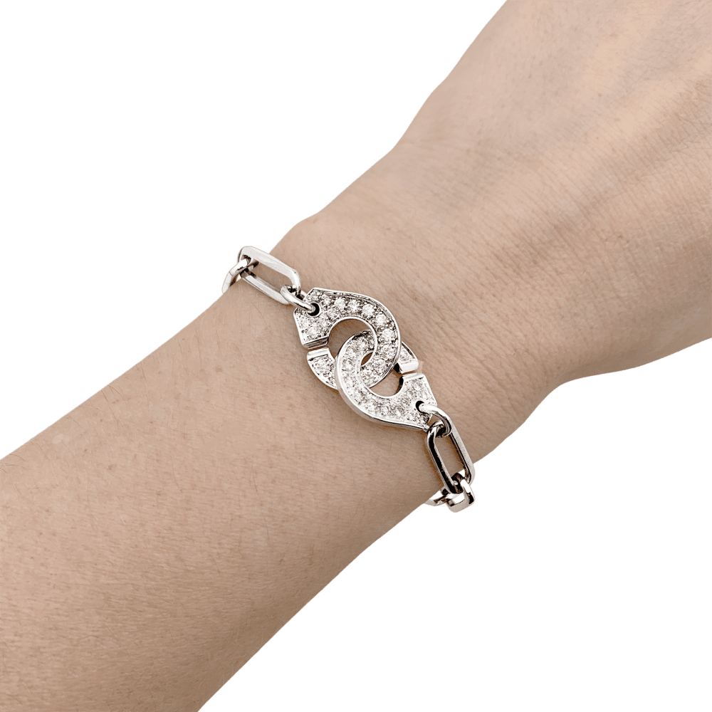Bracelet Dinh Van, "Handcuffs", white gold and diamonds.