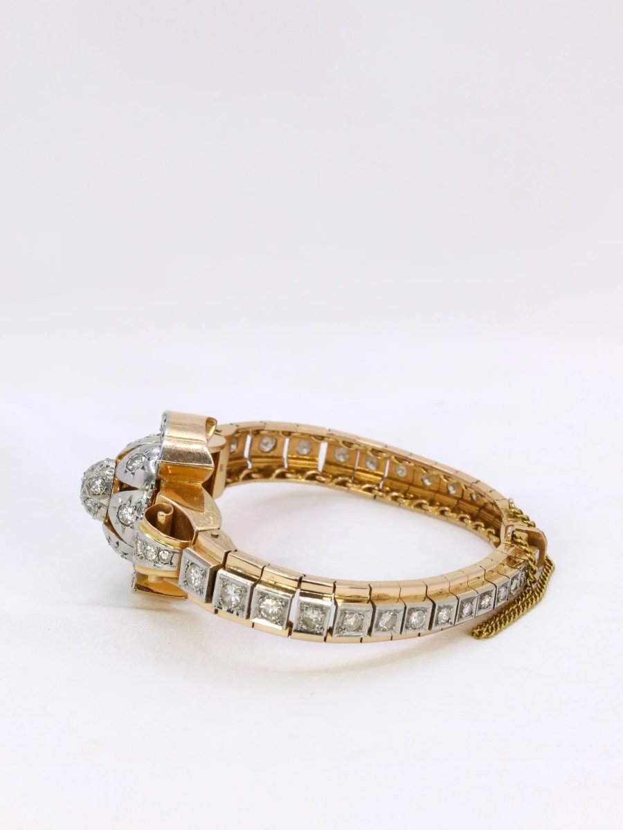Bracelet Montre vintage en or jaune et diamants, 1950 - Castafiore