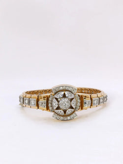 Bracelet Montre vintage en or jaune et diamants, 1950 - Castafiore