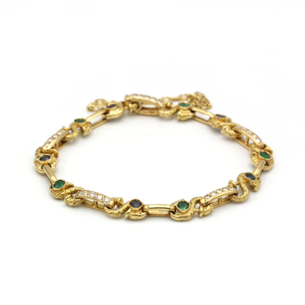 Bracelet - Or, diamants, saphirs et émeraudes - Castafiore