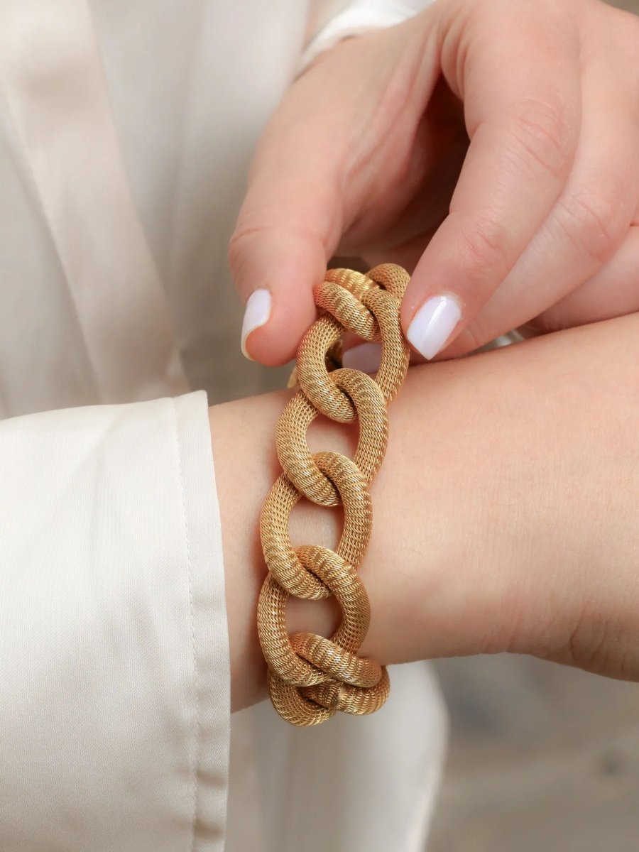 Bracelet or jaune maillons textures ovales - Castafiore