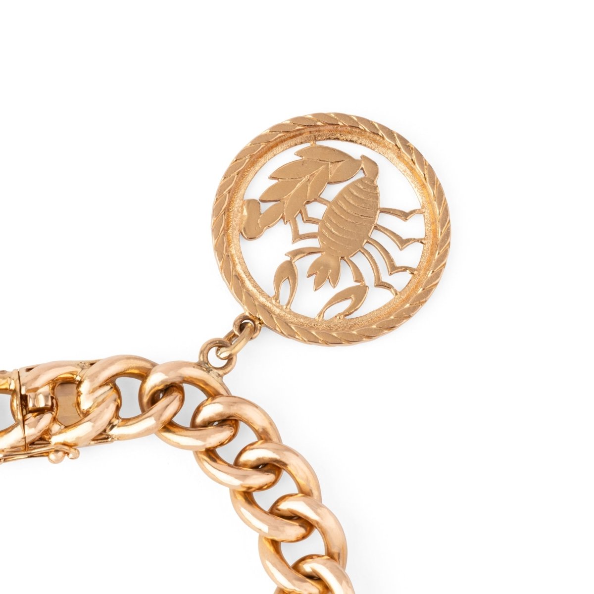 Bracelet or rose 18k,maillon gourmette orné de 4 breloques - Castafiore