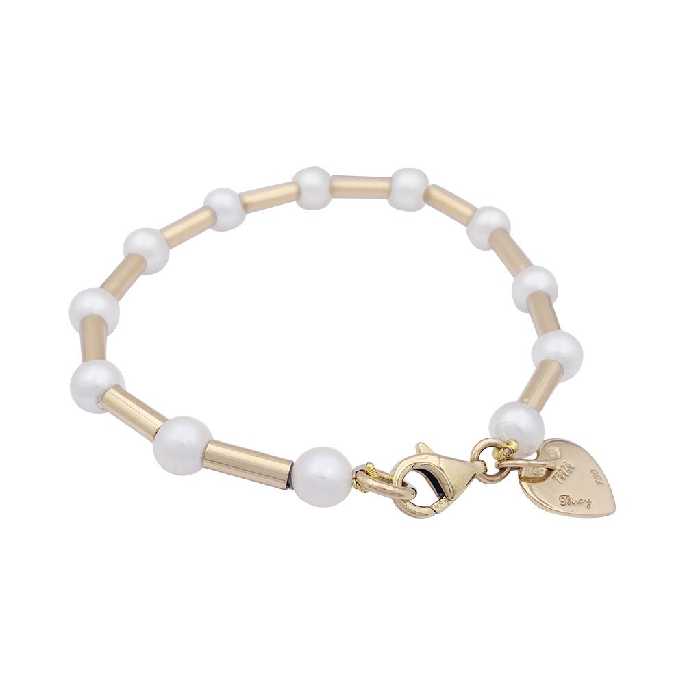 Bracelet Poiray, "Roseau", or jaune et perles. - Castafiore