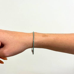 Bracelet Riviere en or blanc et émeraudes - Castafiore