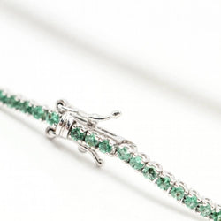 Bracelet Riviere en or blanc et émeraudes - Castafiore