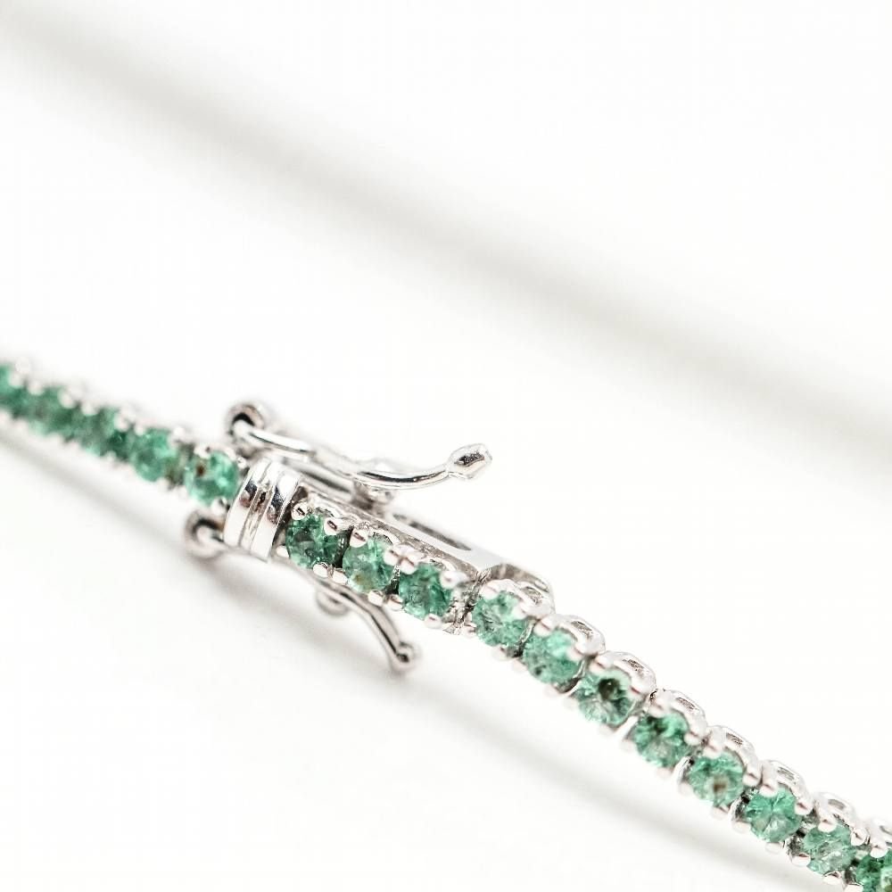 Bracelet Riviere en or blanc et émeraudes - Castafiore