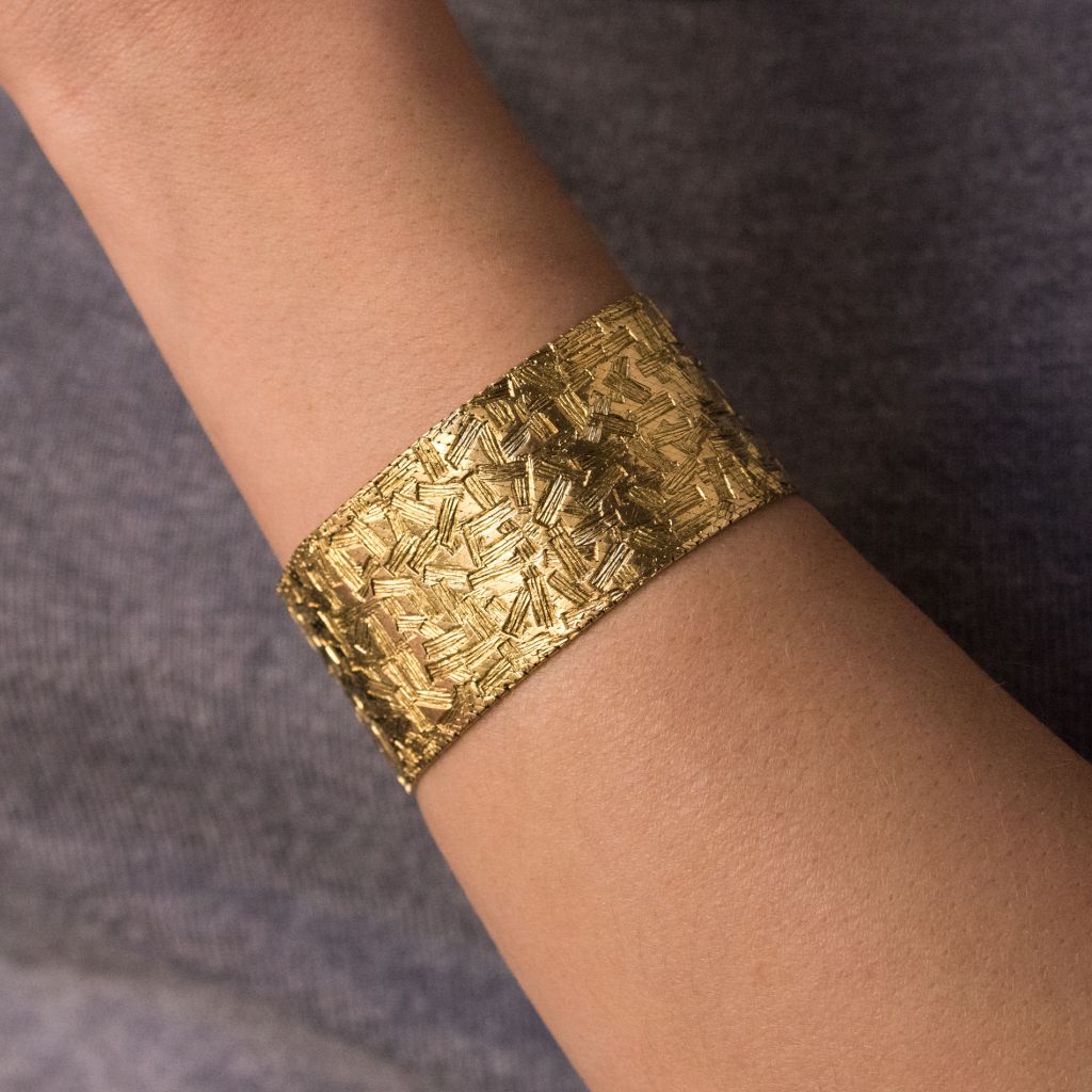 Bracelet ruban d'or à décor moderniste - Castafiore