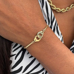 Bracelet Souple DINH VAN "Menottes R10" en or jaune - Castafiore