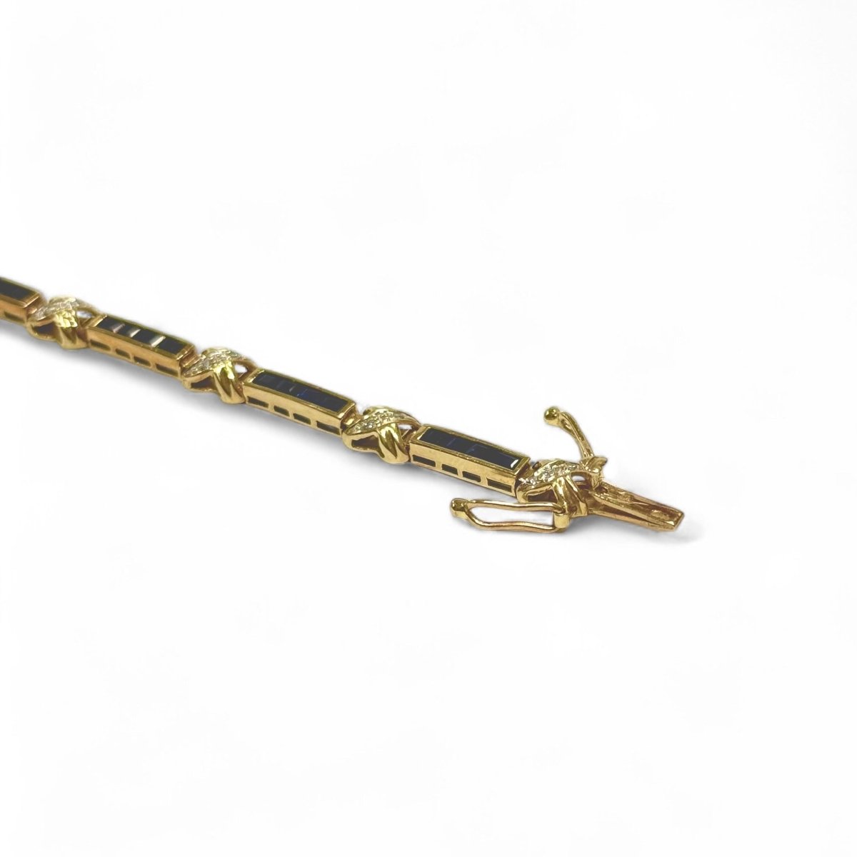 Bracelet souple en or jaune, saphirs et diamants - Castafiore