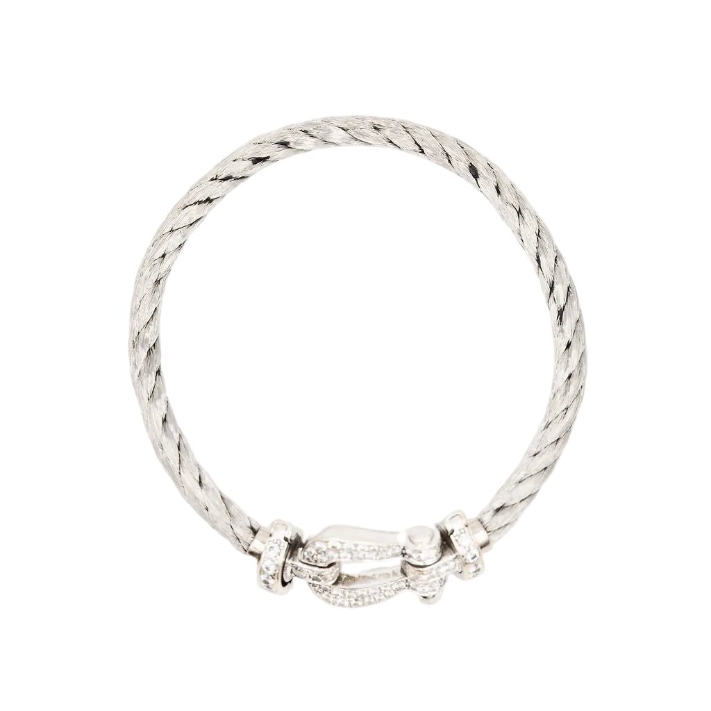 Bracelet Souple FRED "Force 10" en or blanc, acier et diamants - Castafiore