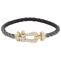 Bracelet Souple FRED "Force 10" en or jaune, acier et diamants - Castafiore