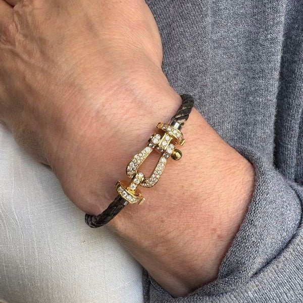 Bracelet Souple FRED "Force 10" en or jaune, acier et diamants - Castafiore