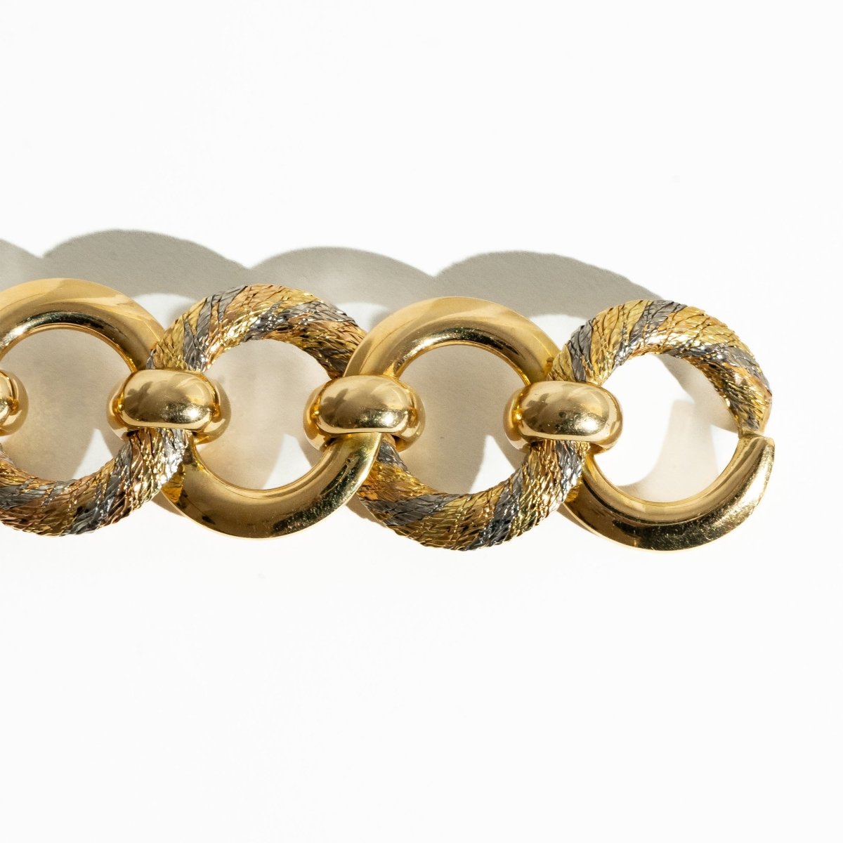 Bracelet Souple GEORGES LENFANT POUR CARTIER en or jaune, or blanc et or rose - Castafiore