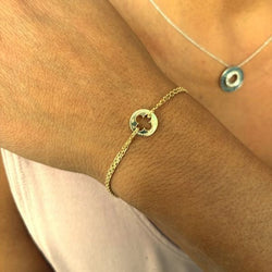 Bracelet Souple LOUIS VUITTON "Empreinte Métal" en or jaune - Castafiore