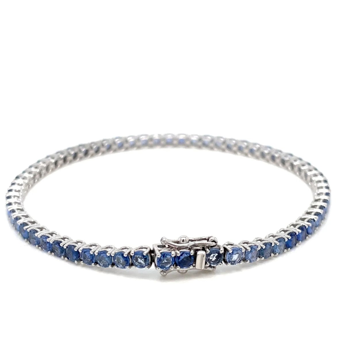 Bracelet tennis en or avec saphir bleu naturel de 7 carats - Castafiore