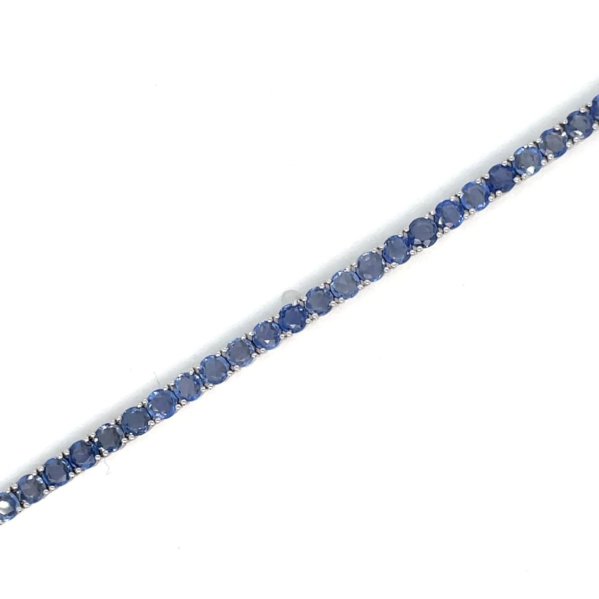 Bracelet tennis en or avec saphir bleu naturel de 7 carats - Castafiore