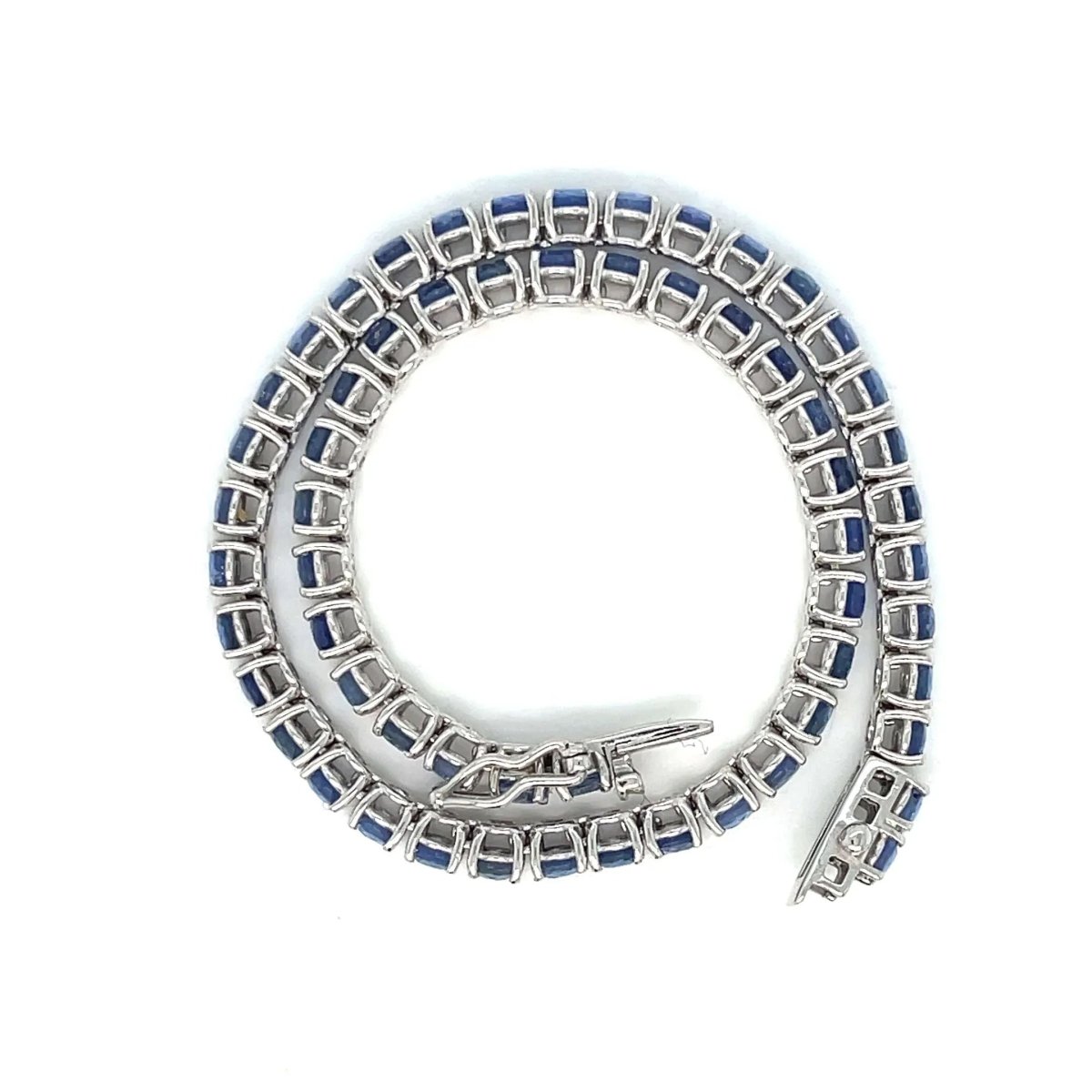 Bracelet tennis en or avec saphir bleu naturel de 7 carats - Castafiore