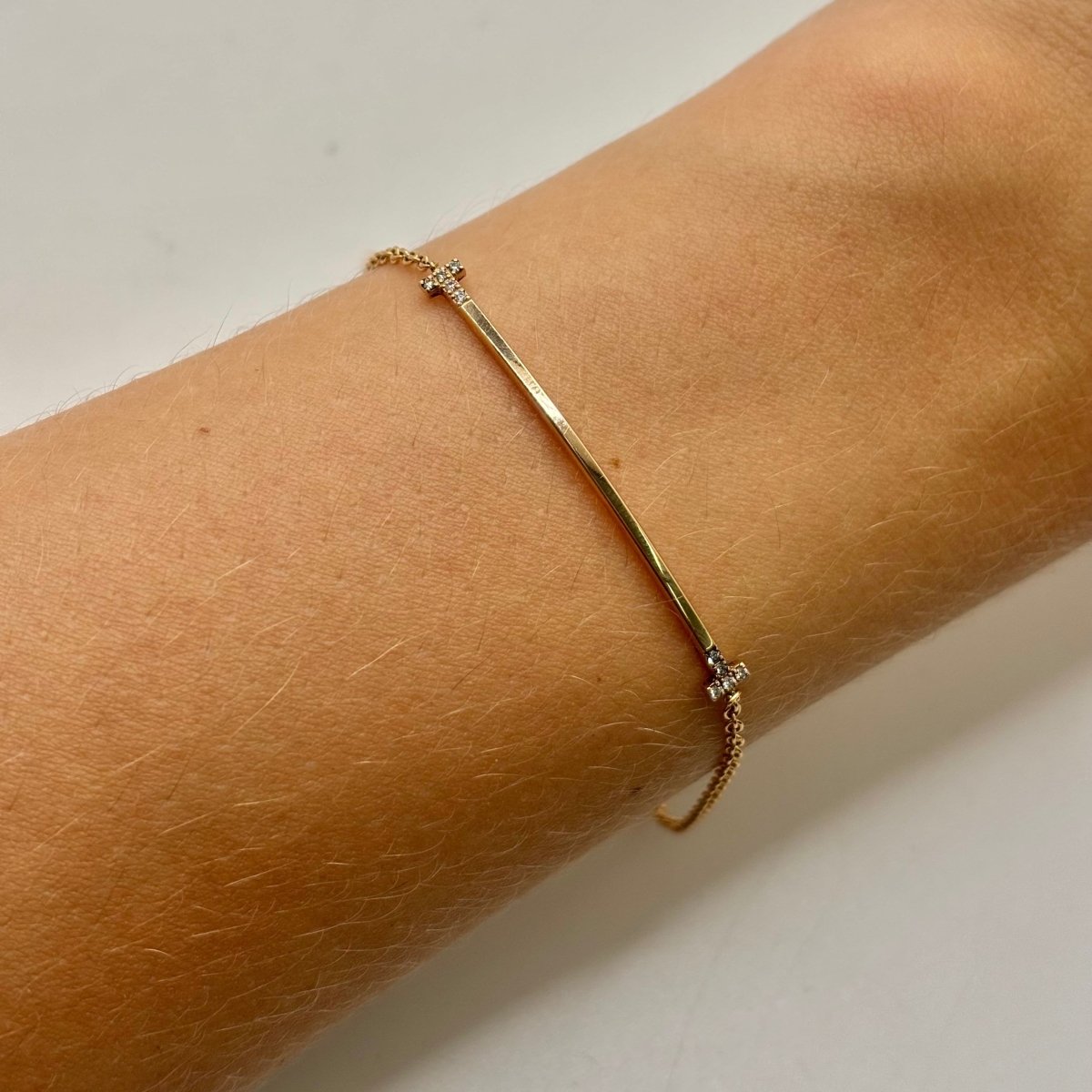Bracelet TIFFANY & CO. "T" en or jaune et diamants - Castafiore