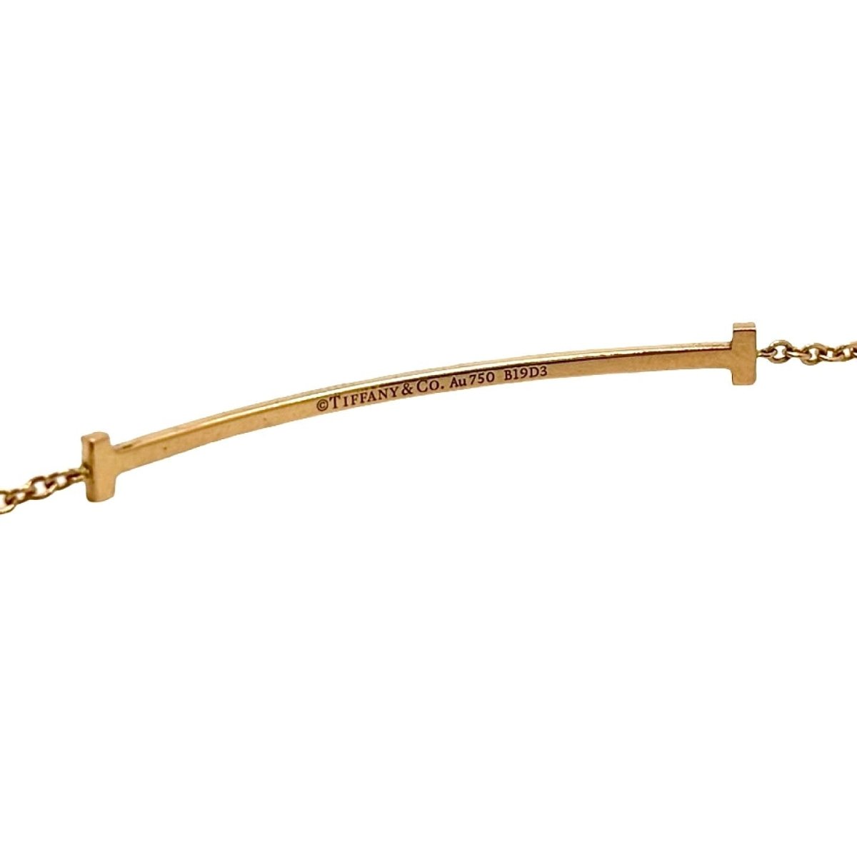 Bracelet TIFFANY & CO. "T" en or jaune et diamants - Castafiore