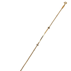 Bracelet TIFFANY & CO. "T" en or jaune et diamants - Castafiore