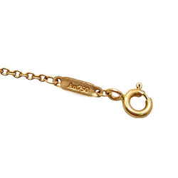 Bracelet TIFFANY & CO. "T" en or jaune et diamants - Castafiore