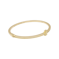 Bracelet Tiffany & Co., "Tiffany T" en or jaune et diamants. - Castafiore