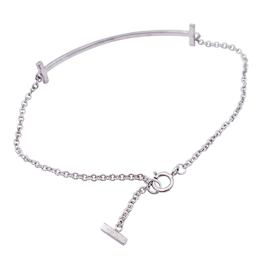 Bracelet Tiffany & Co., "Tiffany T Smile", or blanc, diamants. - Castafiore