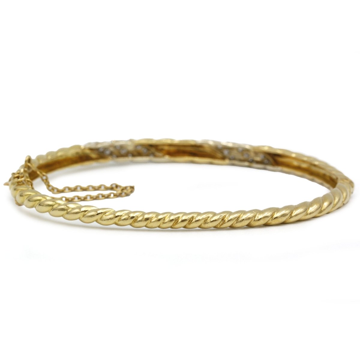 Bracelet Torsadé POIRAY en or jaune et diamants - Castafiore