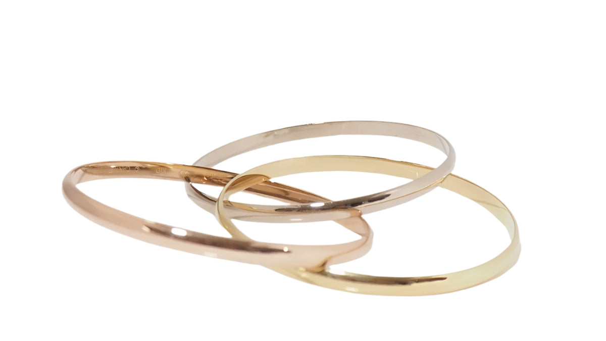 Bracelet Trinity de Cartier d'occasion trois ors - Castafiore
