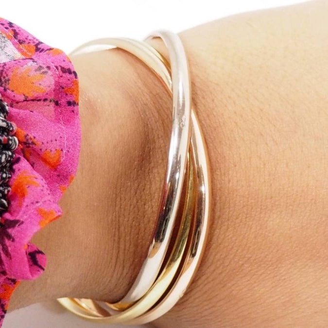 Bracelet Trinity de Cartier d'occasion trois ors - Castafiore