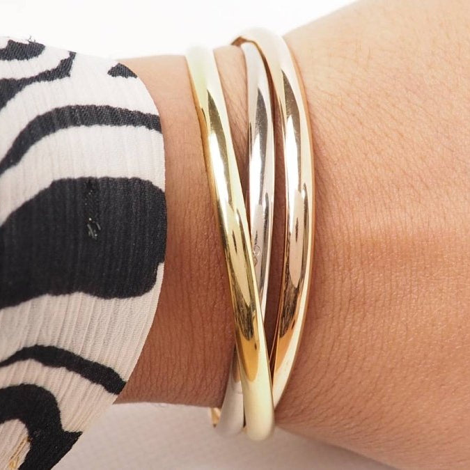 Bracelet Trinity de Cartier d'occasion trois ors - Castafiore