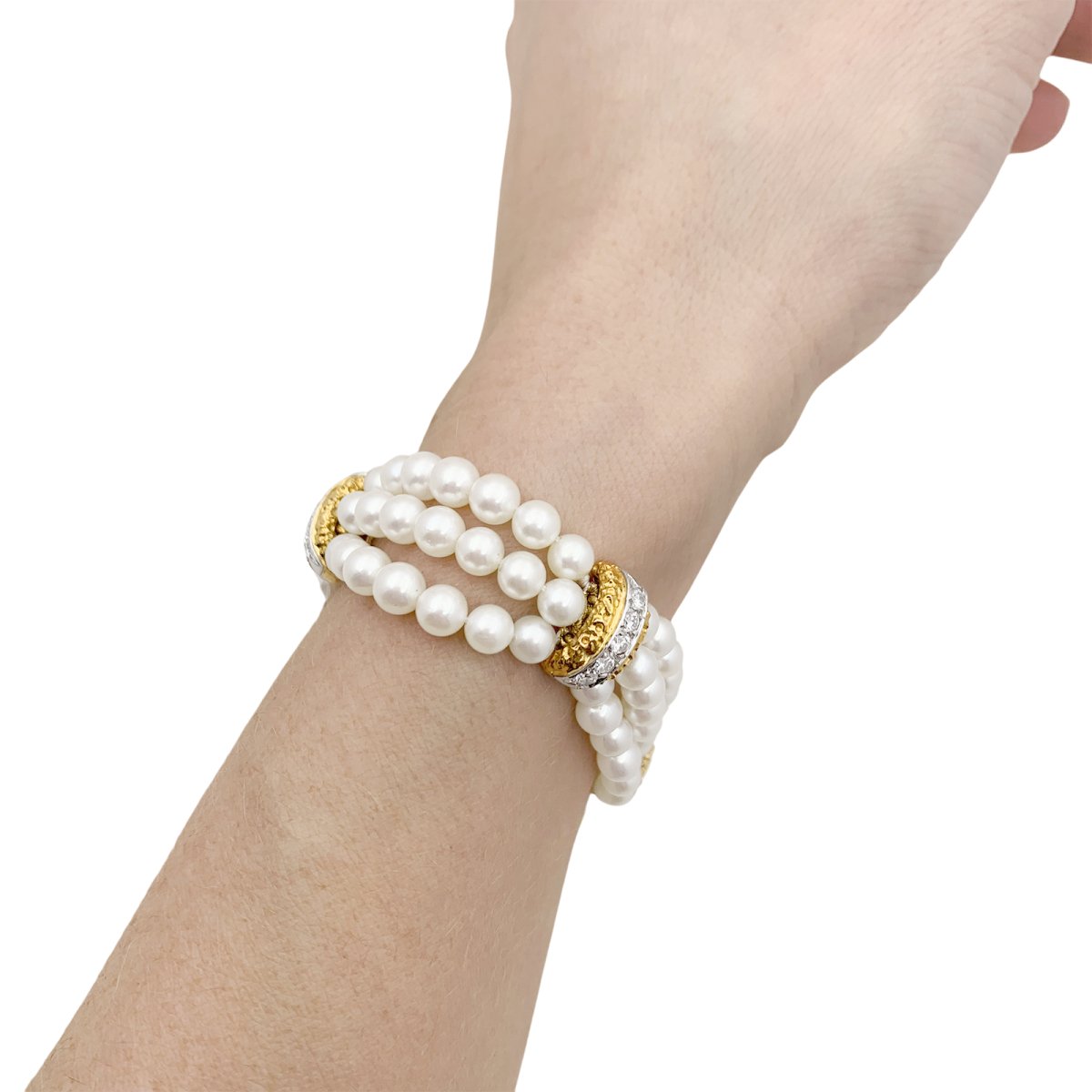 Bracelet VAN CLEEF & ARPELS, deux ors, perles et diamants - Castafiore