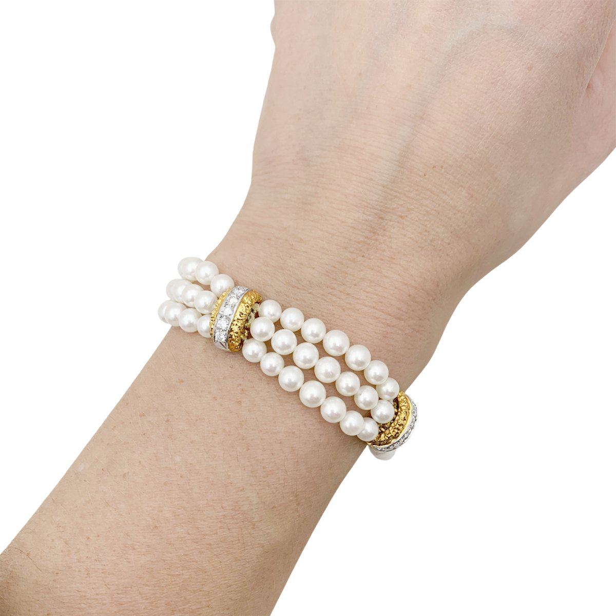 Bracelet VAN CLEEF & ARPELS, deux ors, perles et diamants - Castafiore