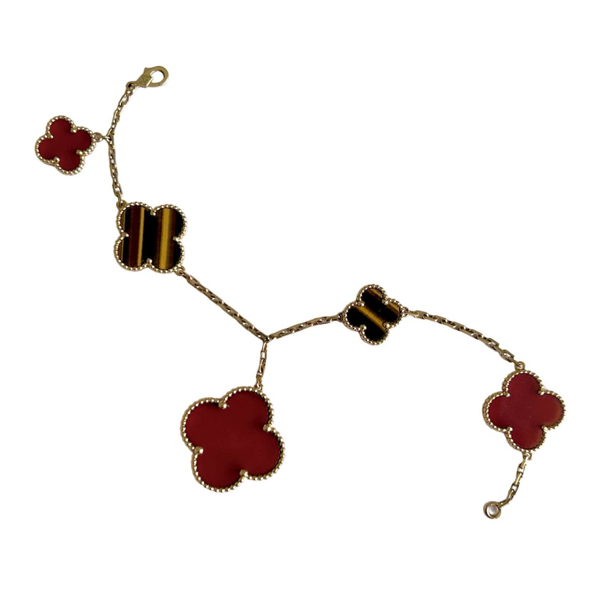 Bracelet VAN CLEEF & ARPELS "Magic Alhambra" en or jaune, oeil - de - tigre et cornaline - Castafiore