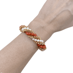 Bracelet VAN CLEEF & ARPELS "Twist" en or jaune, perles et corail - Castafiore