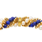 Bracelet VAN CLEEF & ARPELS "Twist" en or jaune, perles et lapis lazuli - Castafiore