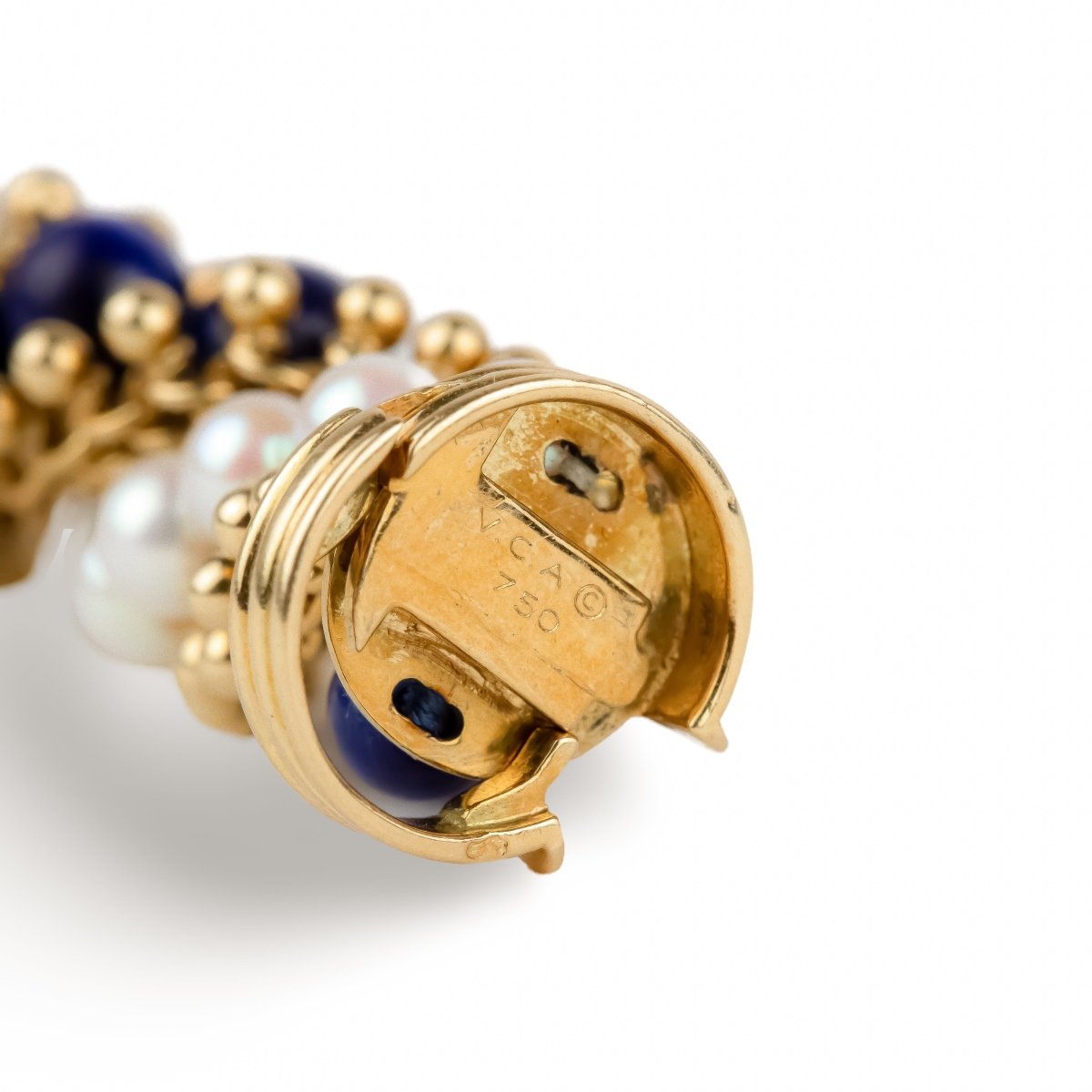 Bracelet VCA "Twist" en or jaune, perles et lapis - lazuli - Castafiore