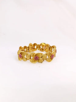 Bracelet vintage fleur en or amati et rubis - Castafiore