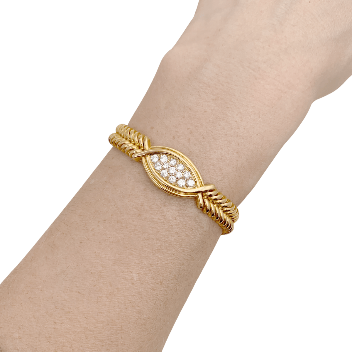 Bracelet vintage FRED en or jaune et diamants - Castafiore